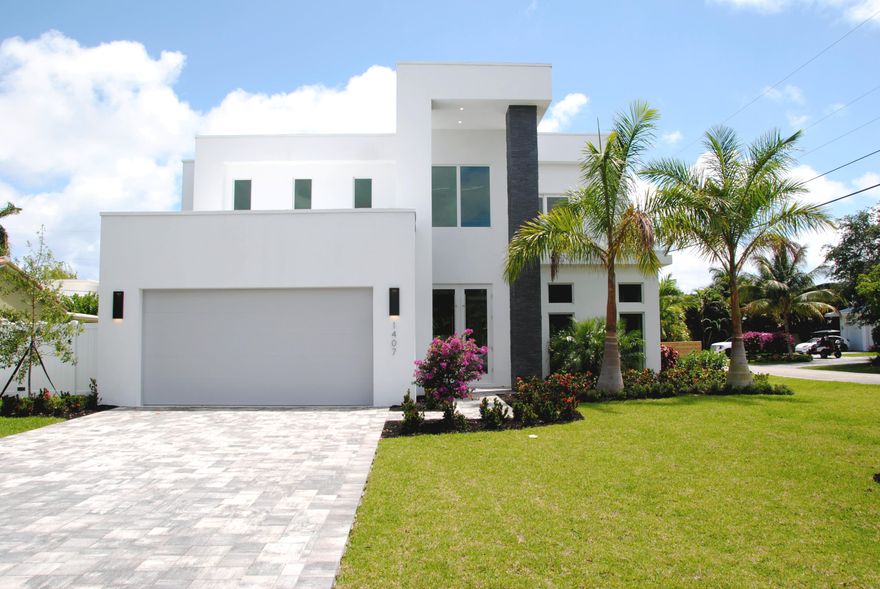 Contemporary and luxurious, two story, 4-bedroom and 3-bathroom newly constructed home with pool and spacious backyard located in Lake Ida neighborhood in East Delray! Finishes and features throughout the house were uniquely selected with high quality and aesthetic design in mind. Layout of this home was architected with an open-concept, incorporating lots of windows to allow for natural light in the combined living, dining, and kitchen area. Two balconies one overlooking the pool and another facing the west to showcase beautiful sunsets! Whether you're taking advantage of the sunshine and summer patio/grilling area, or spending a day and night cooking indoors with the TV on, this new construction is something we consider a home and not a house.
