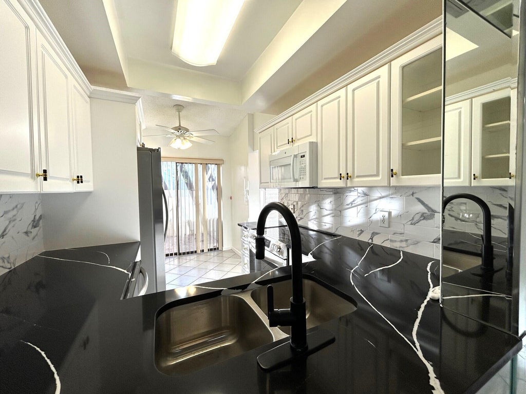 Photo of 3614 English Road #A, Lake Worth, FL 33467 (MLS # R11069021)