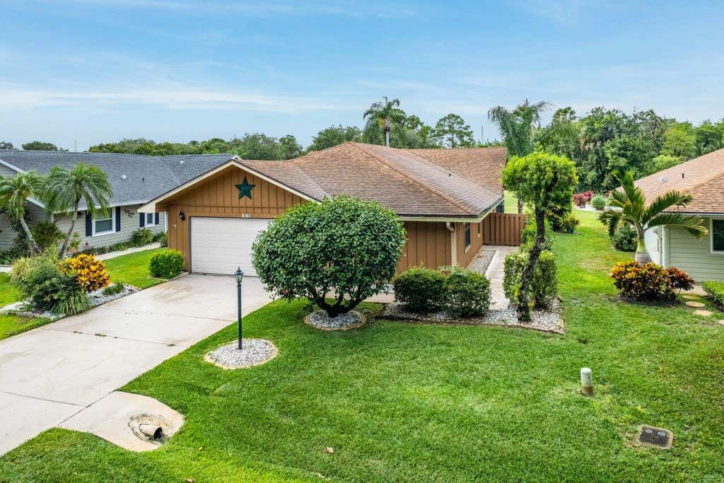 Photo of 8161 SE Eaglewood Way, Hobe Sound, FL 33455 (MLS # R10980935)