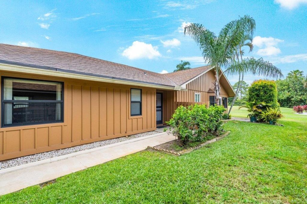 Photo of 8161 SE Eaglewood Way, Hobe Sound, FL 33455 (MLS # R10980935)