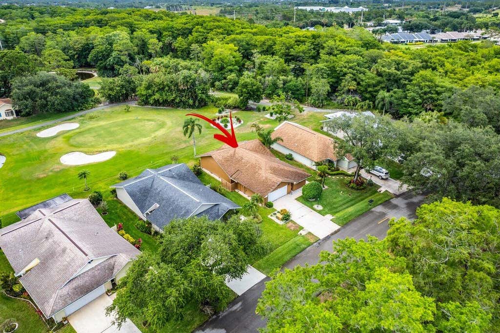 Photo of 8161 SE Eaglewood Way, Hobe Sound, FL 33455 (MLS # R10980935)