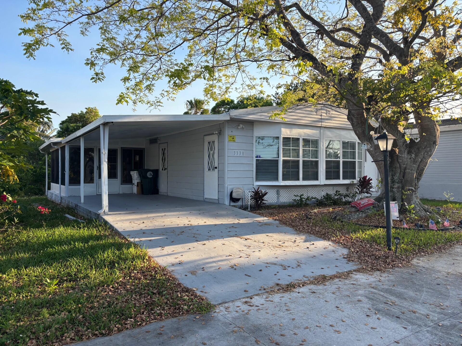 DON'T MISS THE OPPORTUNITY TO VIEW THIS BEAUTIFUL 2 BEDROOMS, 2 BATH'S, LARGE FLORIDA ROOM THAT CAN BE CONVERTED INTO A 3RD BEDROOM AND CANAL WATER VIEW. THIS MOBILE HOME HAS BEING RENOVATED TO INCLUDE NEW LAMINATED FLOORS, NEW BATH'S, NEW KITCHEN CABINETS, GRANITE COUNTER TOP AND NEW APPLIANCES. THE LIVING SPACE IS PERFECT FOR RELAXATION AND DELIGHTFUL. LOCATED WITHIN A PEACEFUL AND GATED 55+ COMMUNITY. A FEW MILES FROM THE OCEAN, MAJOR AIRPORTS, HOSPITAL AND MORE. THE LOT RENTAL IS $1003 PER MONTH. MAKE THIS MOBILE HOME YOURS!!!