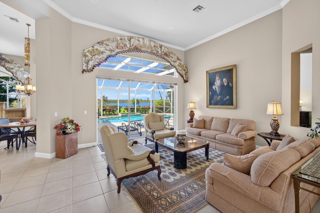Photo of 42 Windward Isle, Palm Beach Gardens, FL 33418 (MLS # B26088357)