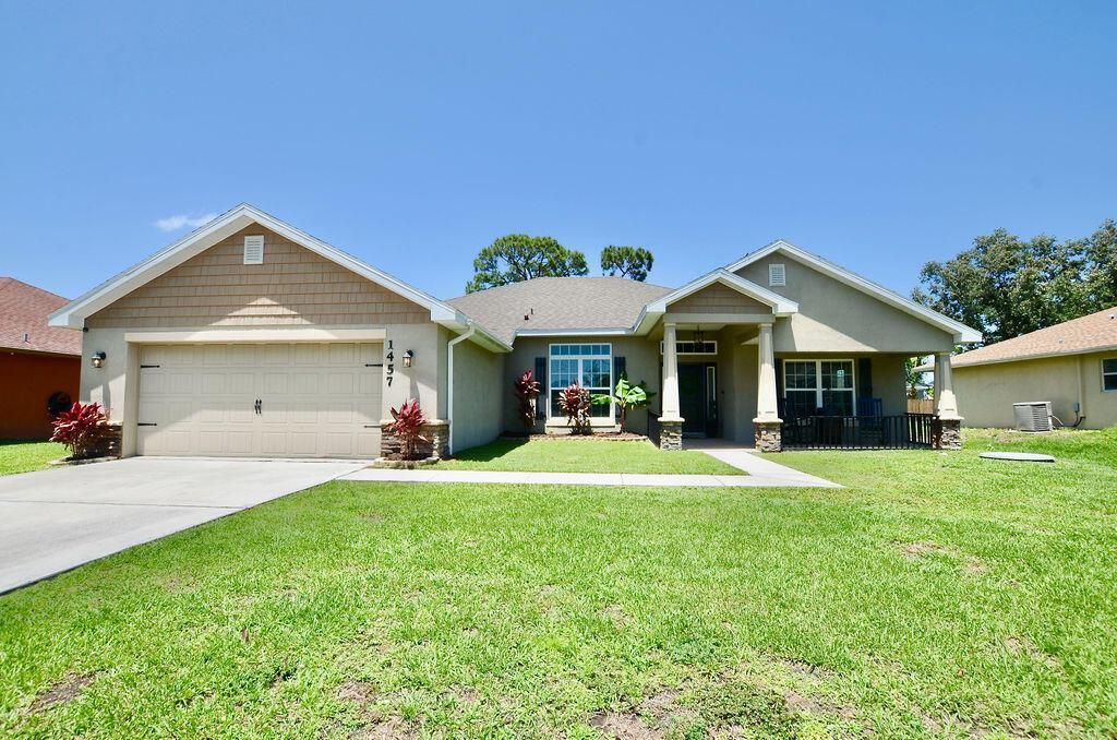 Photo of 1457 SW Jacksonville Avenue S, Port St Lucie, FL 34953 (MLS # R10896568)