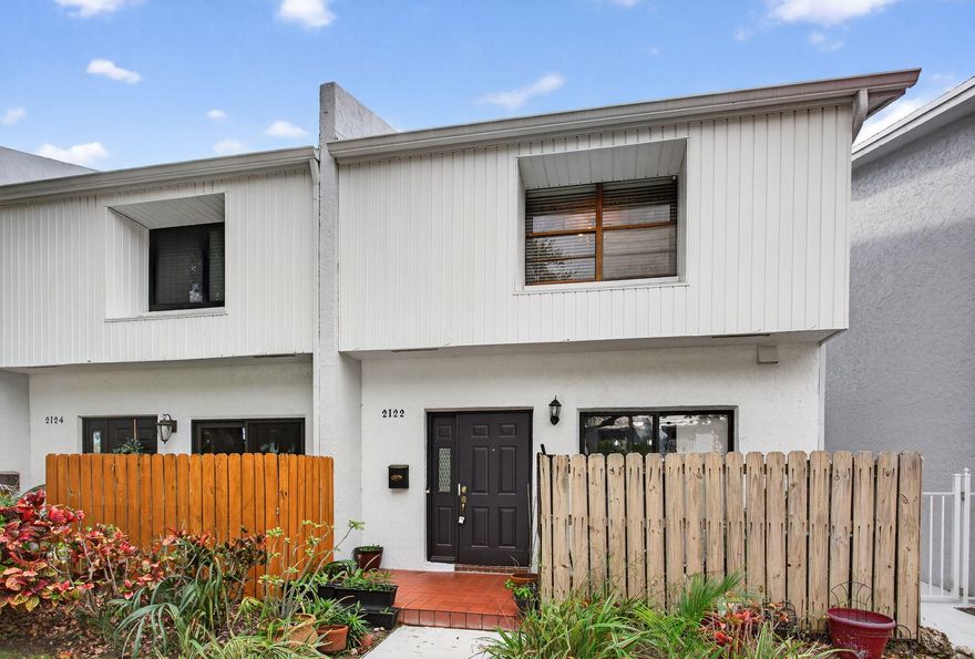 This beautifully maintained townhouse offers new roof, new paint, no pending assessments & flood insurance included. It is nestled in the desirable coastal town of Lighthouse Point. 2BR/2.5BA w/ spacious layout featuring entry closet, open living/dining area, 1st floor half bath & convenient in-unit laundry. Upstairs 2 generously sized bedrooms & 2 full baths. Step outside to your private, enclosed patio overlooking the community pool. With its peaceful view & close proximity, it truly feels like your own backyard oasis, perfect for morning coffee or unwinding in the evening. Enjoy the quiet charm of Lighthouse Pt  located just minutes from the sparkling waters of the Atlantic & short drive to Pompano & Deerfield Beaches while maintaining a quiet residential feel.