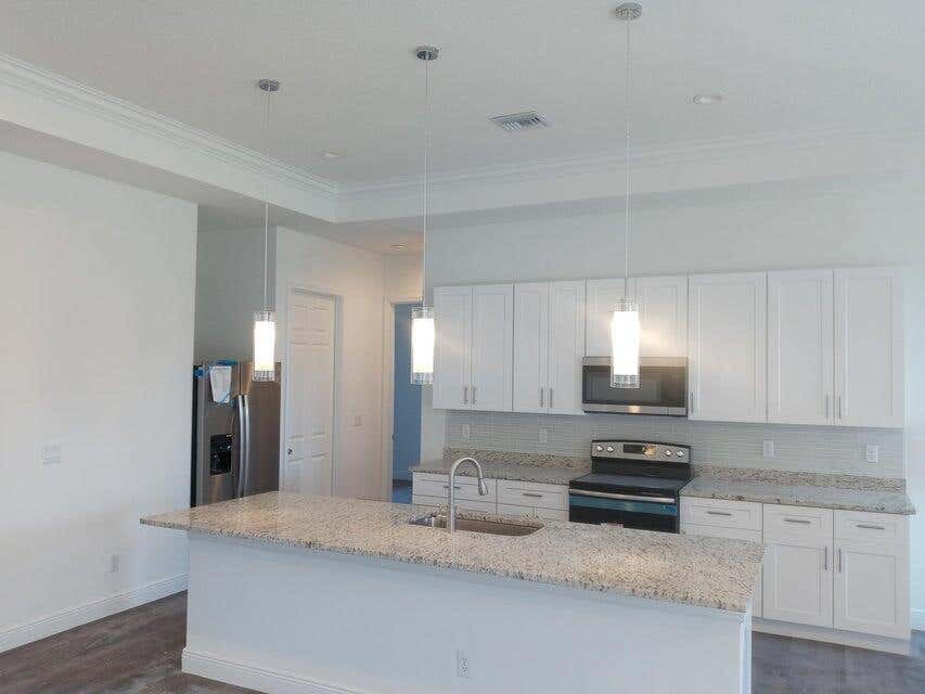 Photo of 986 SW College Park Road, Port Saint Lucie, FL 34953 (MLS # R11106951)