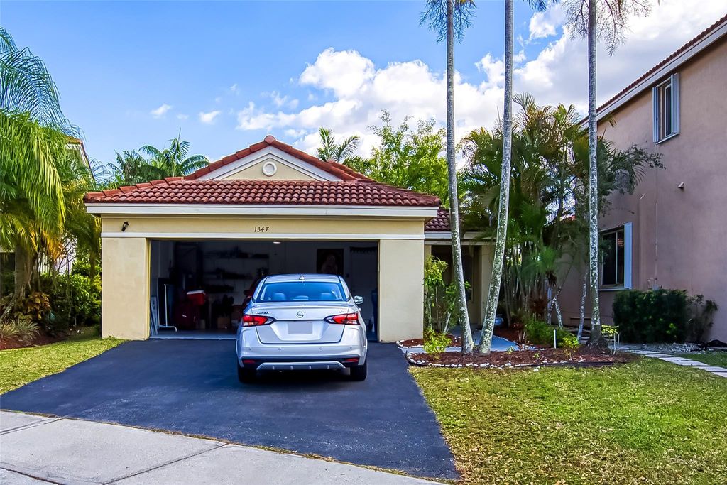 Photo of 1347 Plumosa Way, Weston, FL 33327 (MLS # F10551735)