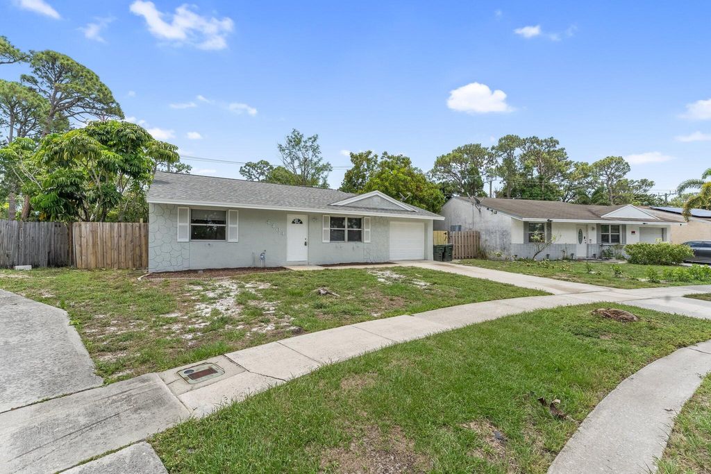 Photo of 4404 Nicia Way, Greenacres, FL 33463 (MLS # R11091145)