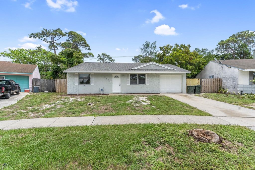 Photo of 4404 Nicia Way, Greenacres, FL 33463 (MLS # R11091145)