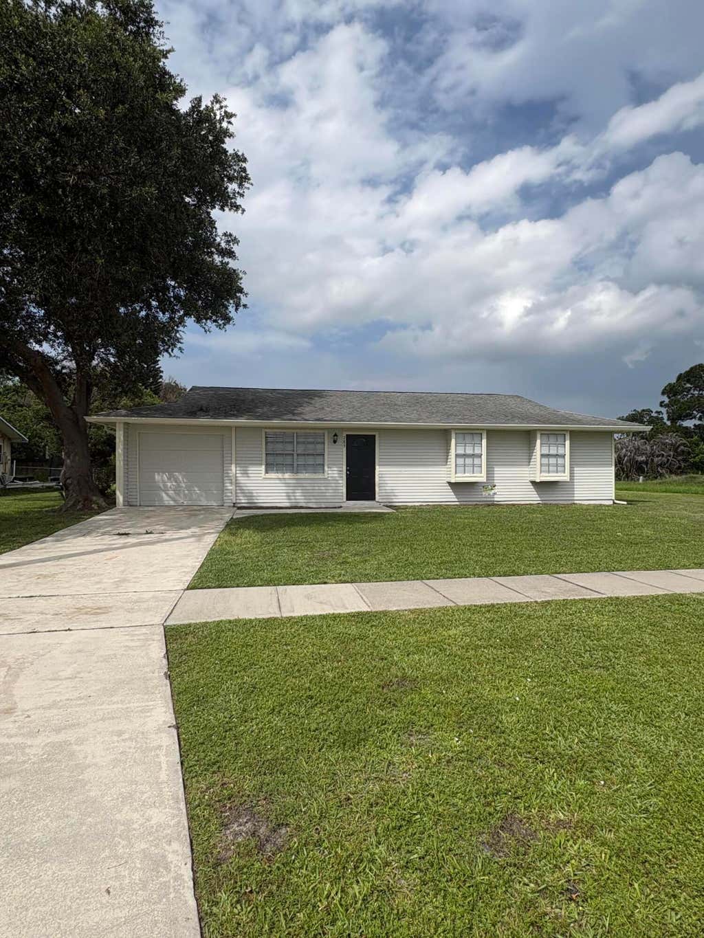 Photo of 285 NE Floresta Drive, Port Saint Lucie, FL 34983 (MLS # B26037057)