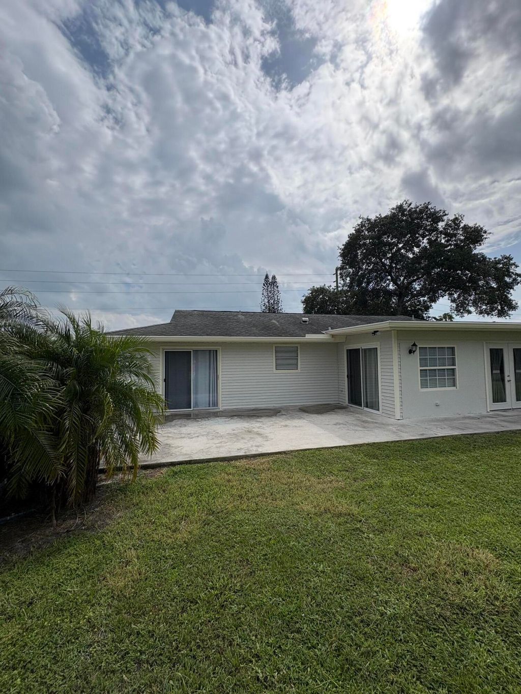 Photo of 285 NE Floresta Drive, Port Saint Lucie, FL 34983 (MLS # B26037057)