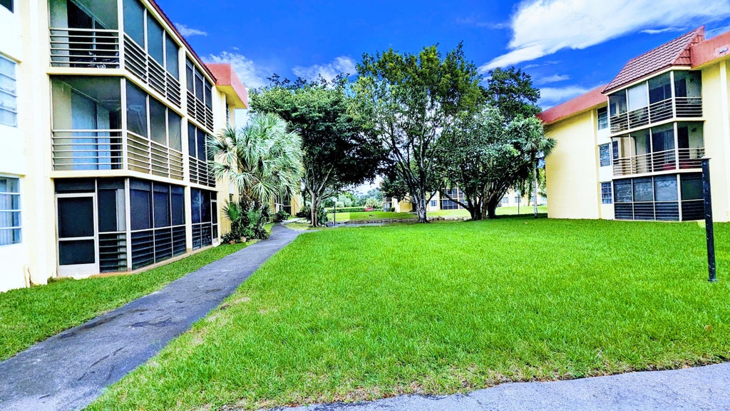 Photo of 3253 Foxcroft Road #210, Miramar, FL 33025 (MLS # B26035275)