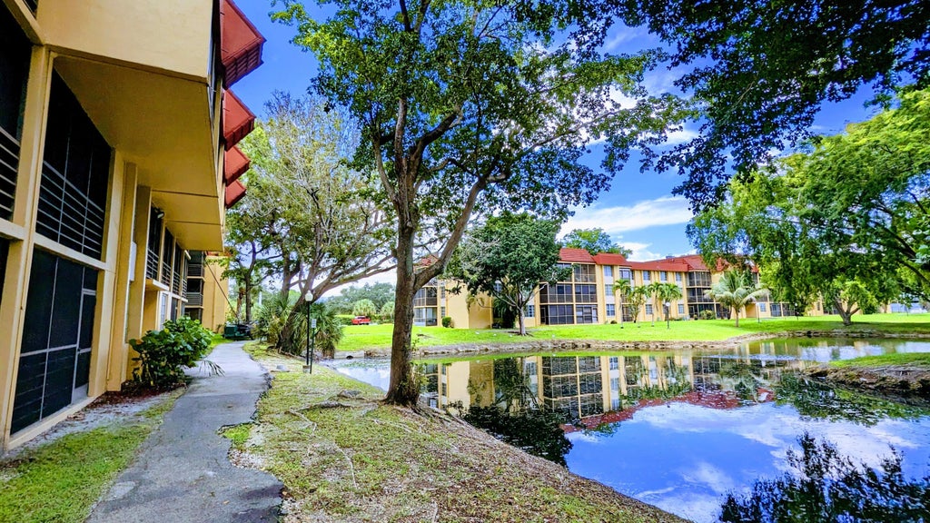 Photo of 3253 Foxcroft Road #210, Miramar, FL 33025 (MLS # B26035275)