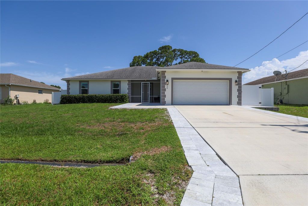 Photo of 998 SW Romaine Lane, Port Saint Lucie, FL 34953 (MLS # F10446756)