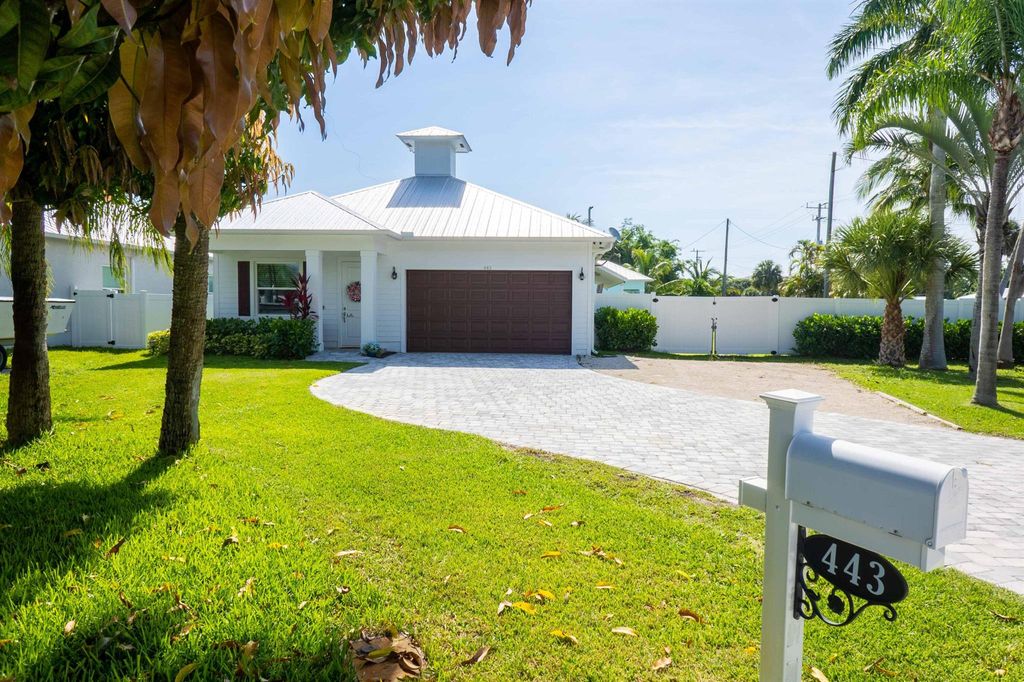 Photo of 443 SE Dolphin Drive, Stuart, FL 34996 (MLS # R10900444)