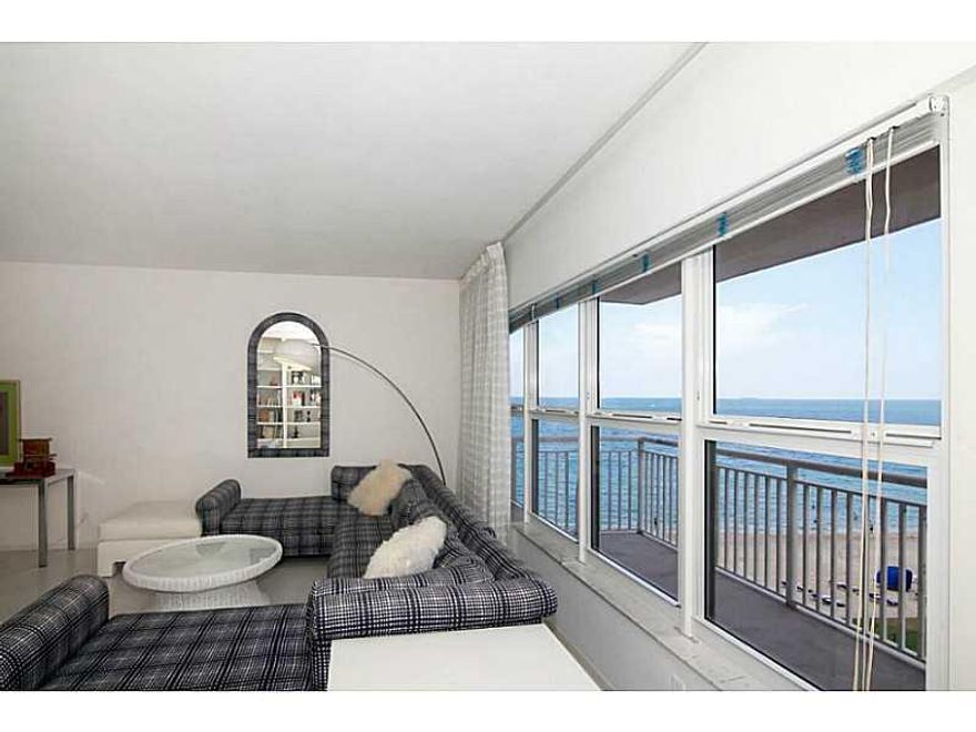 Rare opportunity to own this highly desirable sunny south side unit.  High impact windows allow you to gaze out over the ocean from the living room & bedrooms. Spacious balcony to enjoy southeast breezes & ocean view. Put your own personal touch on this b right, & airy condo & create the beach home of your dreams. In this building you are in the heart of Galt Ocean Mile, literally steps to the sand and walking distance to dining, shopping and banking.  Washer/Dryer in unit.  NEW A/C purchased Feb. 2015.