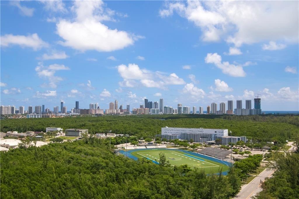 This unit offers one of the best views of the complex. It is a very special corner unit on the 21th floor. 3BR/3BA with 1,800 sq ft This high-rise corner residence features an open floor plan, a modern kitchen with premium appliances, and spacious en-suite bedrooms with large closets. Enjoy stunning ocean and canal views from your private balcony. Building amenities include heated pool, tennis court, fitness center, billiards room, 24-hour doorman, garage, guest, and valet parking. The Prime North Miami location is near shopping, dining, and beaches. Don’t miss this opportunity to experience North Miami luxury real estate! Short Drive to many restaurants, Bal Harbor Shops, and the Aventura Mall. Special assesments $343.26 monthly