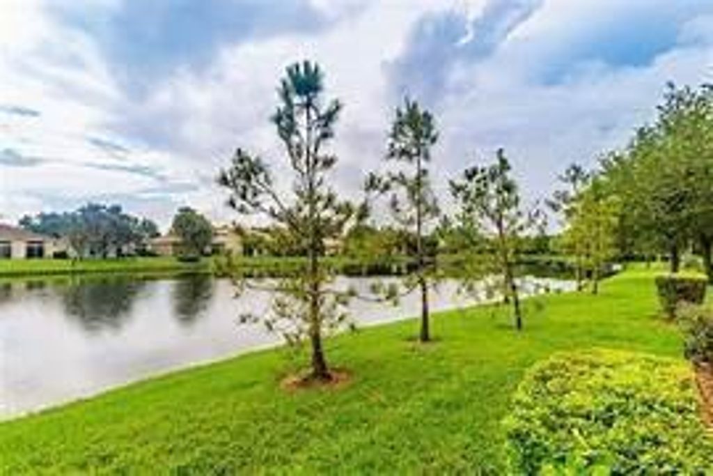 Photo of 4812 N State Road 7 #12206, Coconut Creek, FL 33073 (MLS # B26009742)