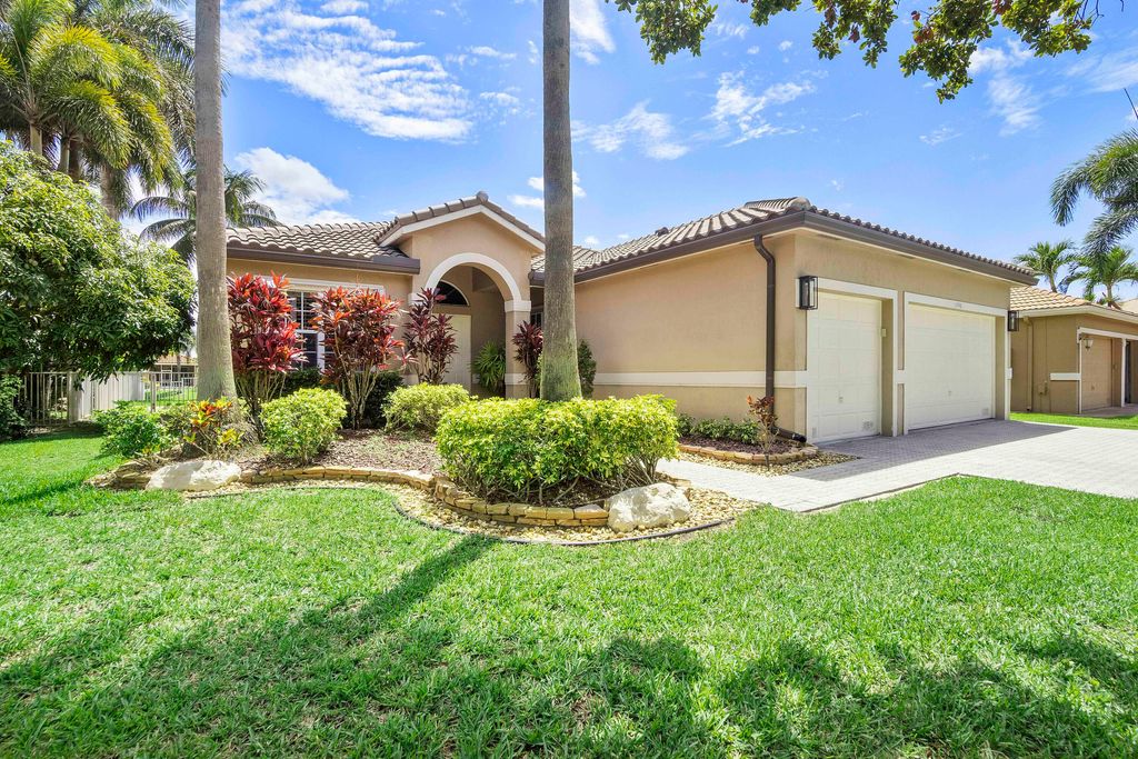 Photo of 11548 NW 49th Court, Coral Springs, FL 33076 (MLS # B26038026)