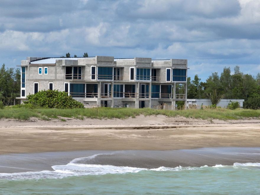 Brand new luxury home enclave nestled between the turquoise Atlantic Ocean & Intracoastal offers unparalleled seaside living. Each home is an oceanfront masterpiece, mere steps from your private beach. This stunning 3-story residence spans 3,911sqft, meticulously designed to maximize breathtaking ocean views. Floor-to-ceiling windows & expansive outdoor terraces blur the line between indoor & outdoor living. Dive into your gas-heated pool & elevate your living experience w/luxury finishes, top-of-the-line appls, & elevator. Pets are welcome in this gated community w/clubhouse & kayak/day dock.