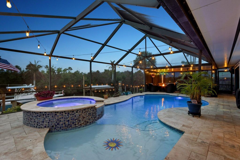 Photo of 310 Holly Avenue, Port Saint Lucie, FL 34952 (MLS # R11167561)