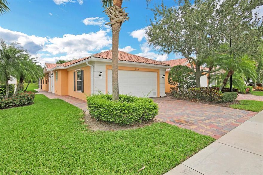 Upgraded Capri Villa in Lakes at Tradition. Enjoy the beautiful lake view from your extended, screened in patio. Home features: wood floors in both bedrooms and living room, tile in main living areas, Crown molding, granite counter tops in the kitchen, SS appliances and plantation shutters. Community offers club house, gym, 2 heated pools, tennis, basketball, manned gate, and walk/bike paths. Hoa fees includes cable, high-speed internet, security- monitoring alarm system, lawn service, all amenities & exterior painting. Close to downtown Tradition for all shopping, restaurants, hospital & easy access to highways.