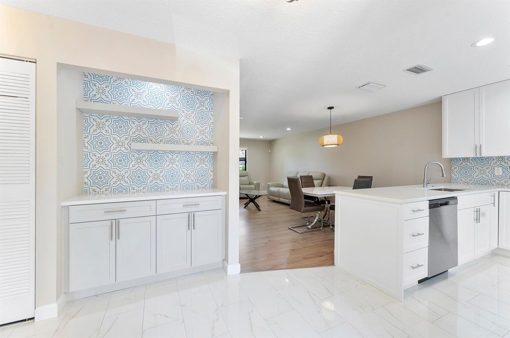 Photo of 319 Elmira Court, Royal Palm Beach, FL 33411 (MLS # R11133367)