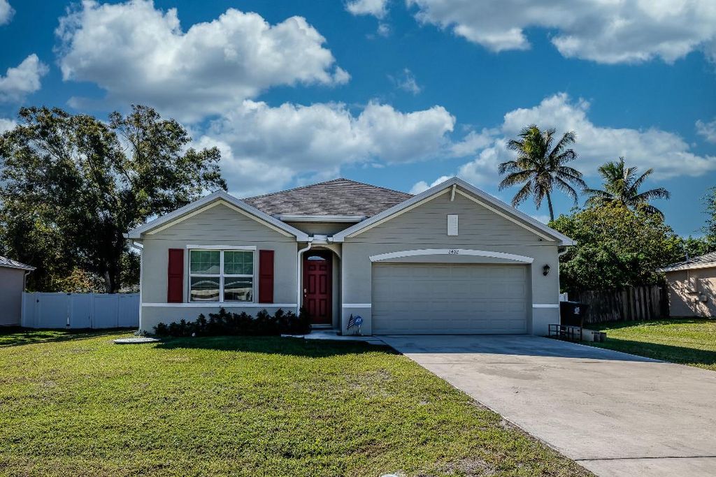 Photo of 2402 SE Gillette Avenue, Port Saint Lucie, FL 34952 (MLS # R11140965)