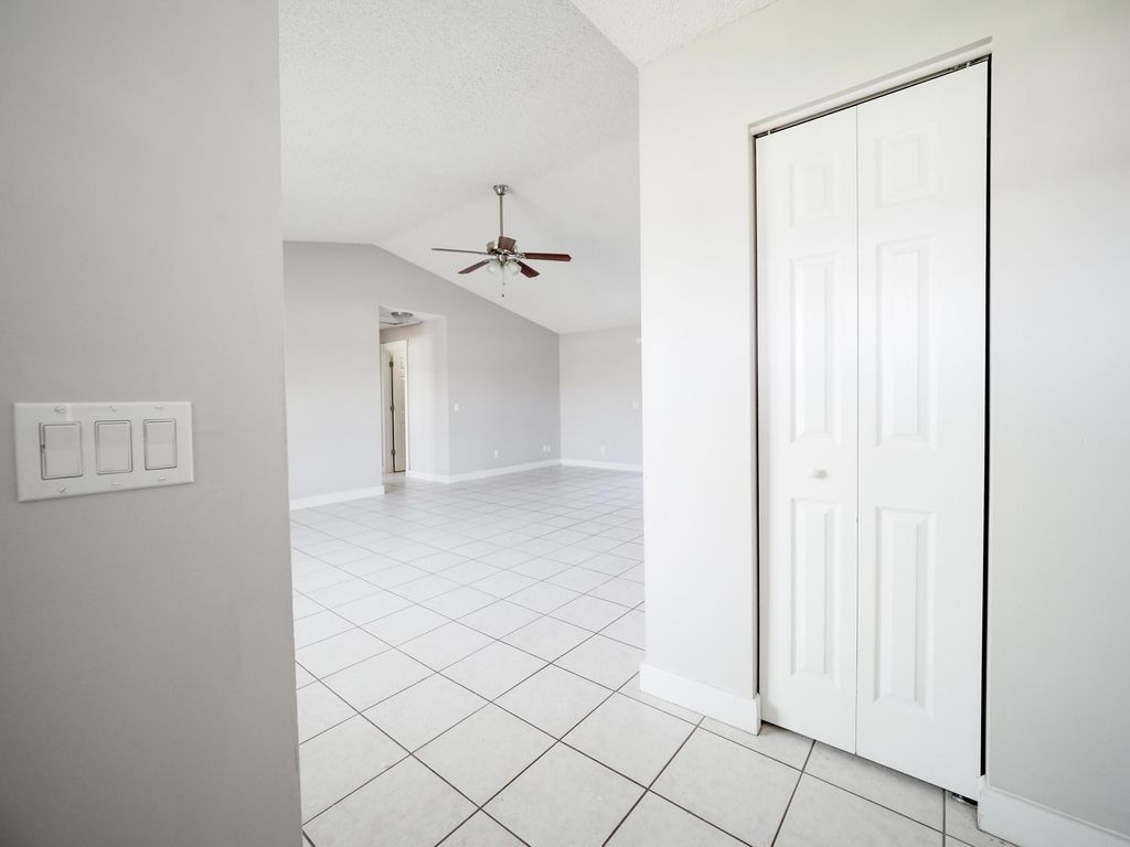 Photo of 3621 SW Rosser Boulevard, Port Saint Lucie, FL 34953 (MLS # B26019277)