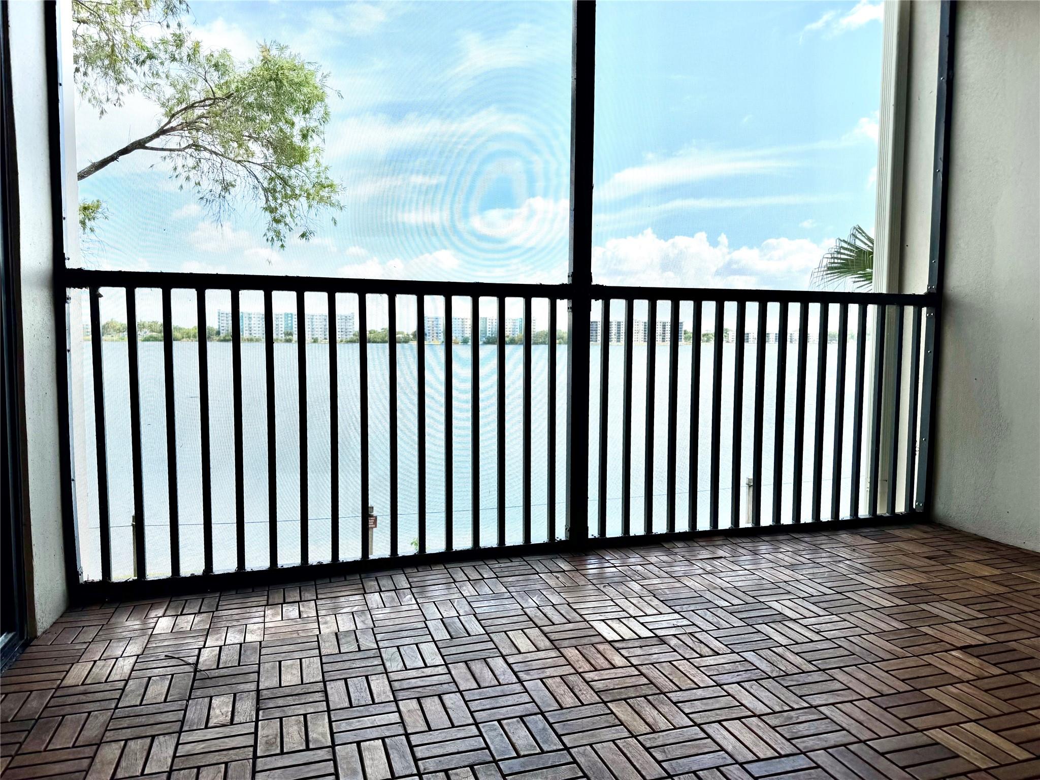 Priced to sell quickly. Extra large (1120 SF) split floor plan. Spectacular views of magnificent Lake Emerald. Pet friendly, 25 pounds or less by breed. Impact windows & doors. Maintenance includes high speed internet and cable. Beautiful kitchen with granite counters. Very LARGE bedrooms, Ideal forever home or the perfect winter rescue. Monthly dues include Comcast's fastest internet and OnDemand for two TVs. Resort living. 3 pools 3 Jacuzzis, 2 saunas, clubhouse, tennis, boating (keep your boat right in front of your patio.) Jog, walk or bike around the lake. Very well equipped 24/7 gym. Lake Emerald is a wonderful place to come home to. Near the Beach, Las Olas, Wilton Drive, the airport & all major highways. 680 credit score required. Can be rented right away. Easy to show.