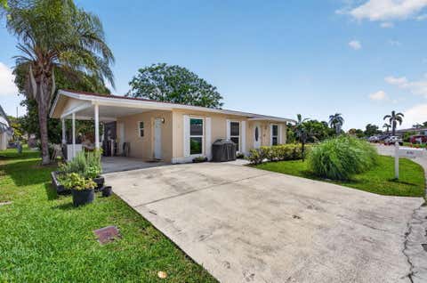 Photo of 1601 NW 48th Place, Deerfield Beach, FL 33064 (MLS # B26030966)