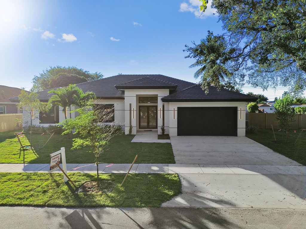 Photo of 621 NW 42nd Avenue, Coconut Creek, FL 33066 (MLS # B26012086)