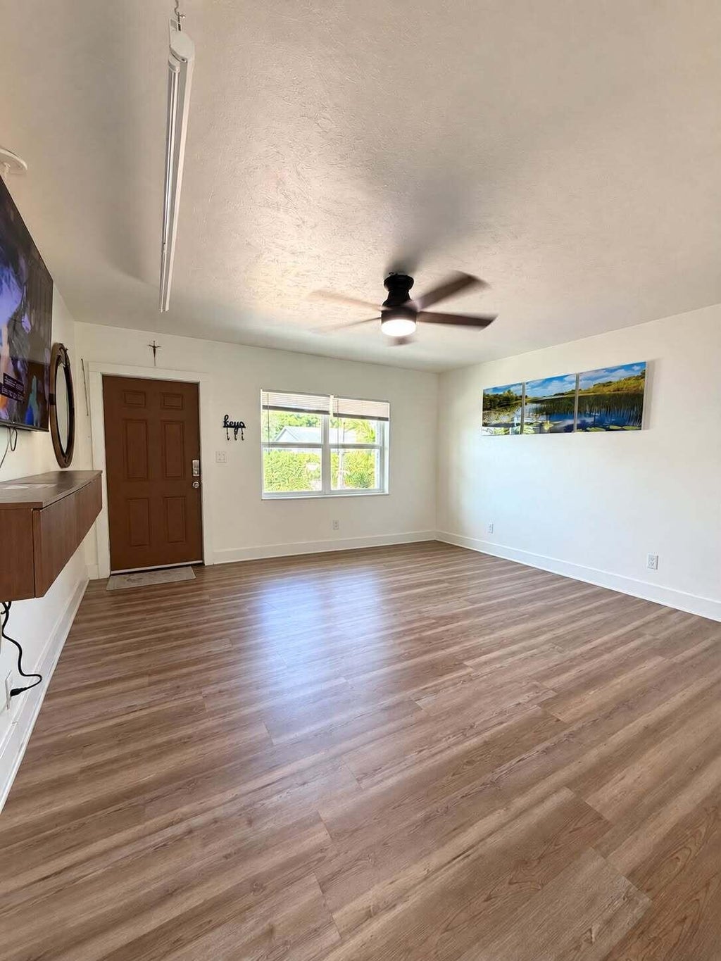 Photo of 175 E 24TH Street, Riviera Beach, FL 33404 (MLS # B26077359)