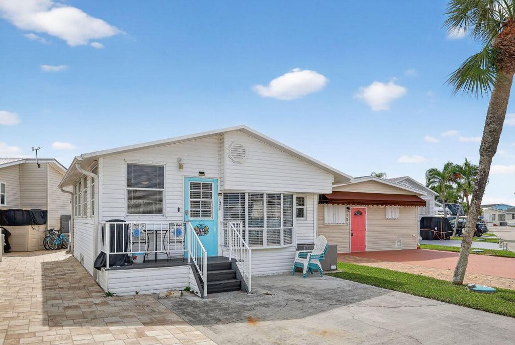 Photo of 121 Nettles Boulevard, Jensen Beach, FL 34957 (MLS # R11121697)