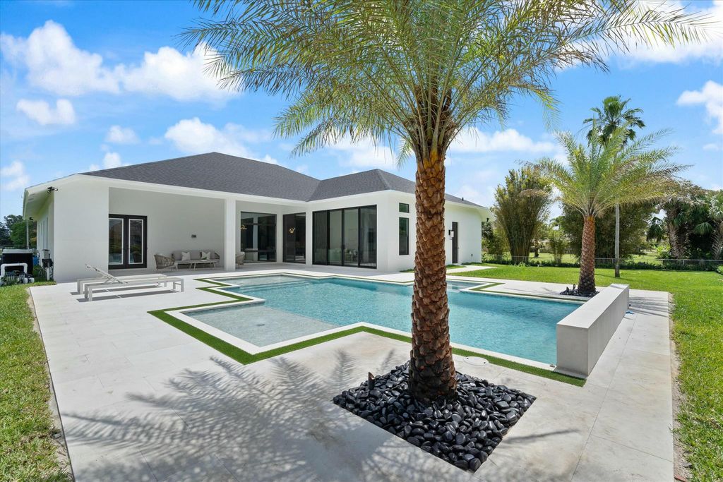 Photo of 16065 72nd Drive N, Palm Beach Gardens, FL 33418 (MLS # R11074811)