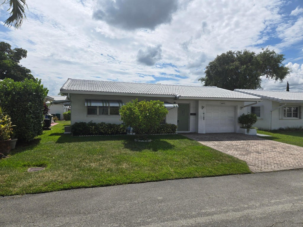 Photo of 5805 NW 83RD Avenue, Tamarac, FL 33321 (MLS # B26084511)