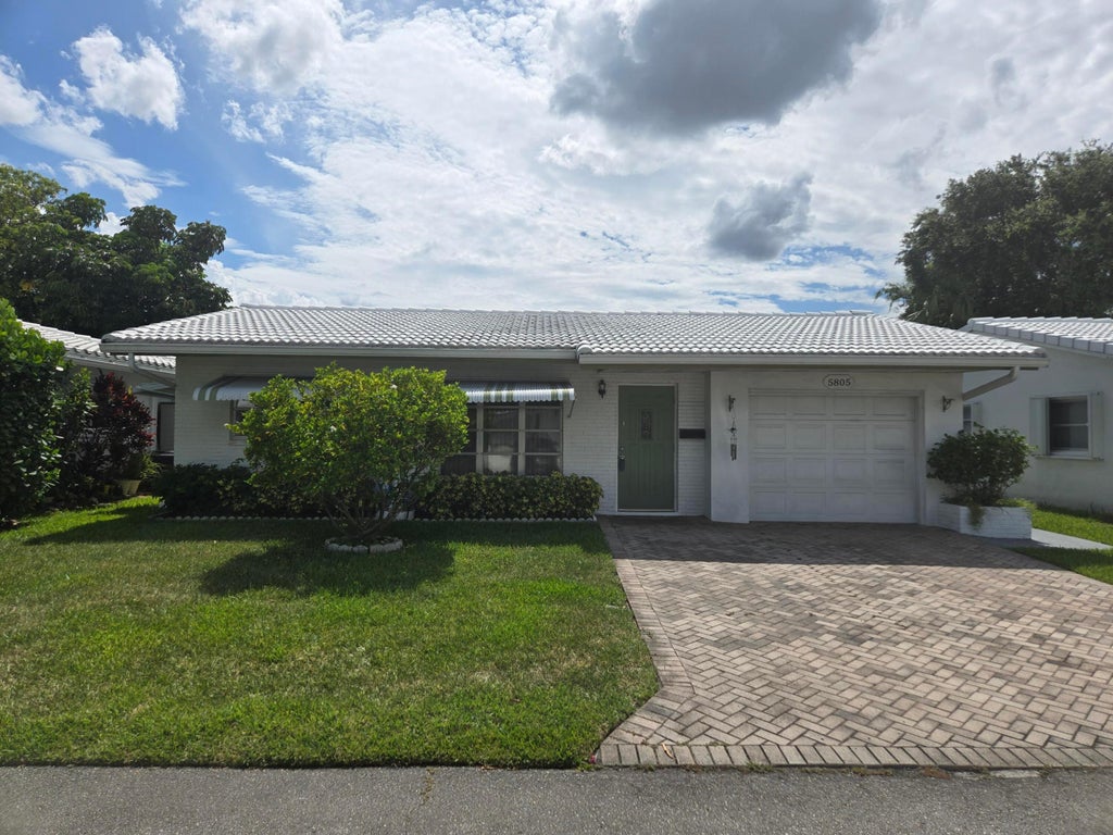 Photo of 5805 NW 83RD Avenue, Tamarac, FL 33321 (MLS # B26084511)