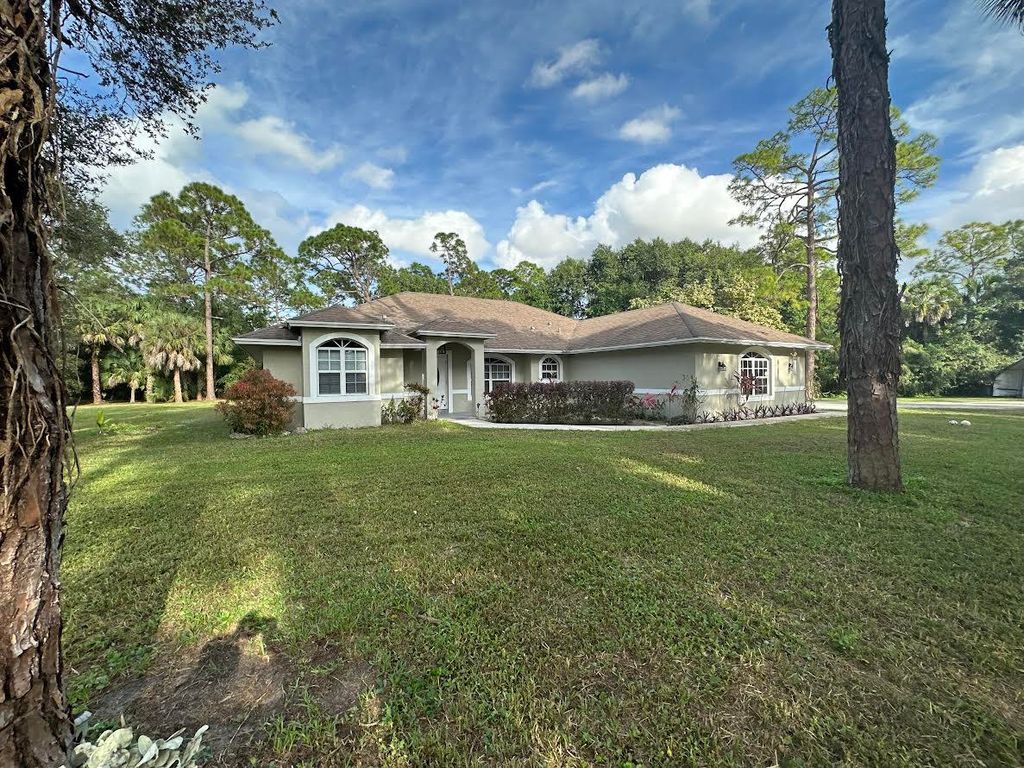 Photo of 15855 99th Court N, West Palm Beach, FL 33412 (MLS # R10938309)