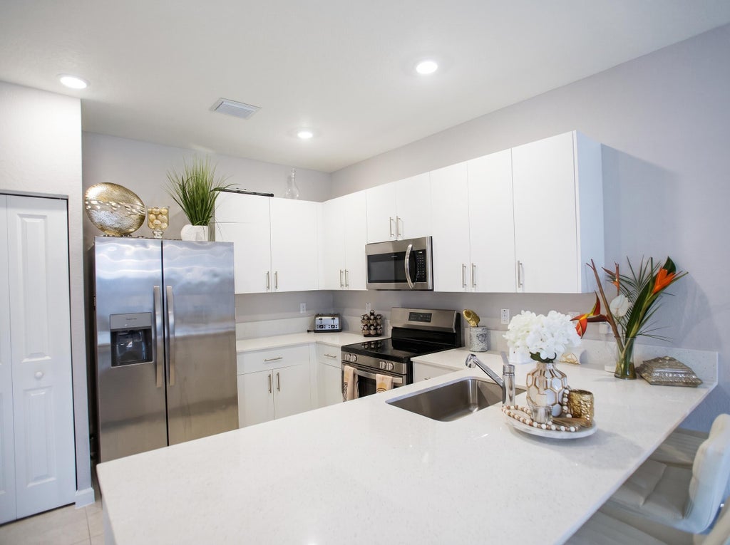 Photo of 11966 NW 46TH Street, Coral Springs, FL 33076 (MLS # B26071696)