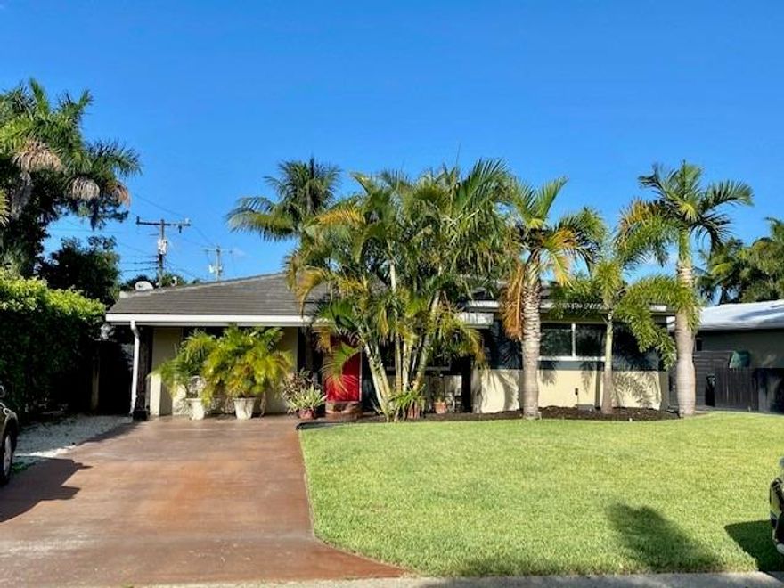 Beautiful 3 bedroom, 2 bath located in North Andrews Gardens. In a quiet neighborhood with easy access to everything you want, 5 minutes from the beach, this truly is a hidden gem. Brand new roof, newer A/C, and full impact windows. Updated kitchen, spacious backyard for expansion or a pool, and a large driveway for multiple cars. One room can be used as either a bedroom or office. Great home for a primary residence, rental, or AirBnb. 24hr showing notice.