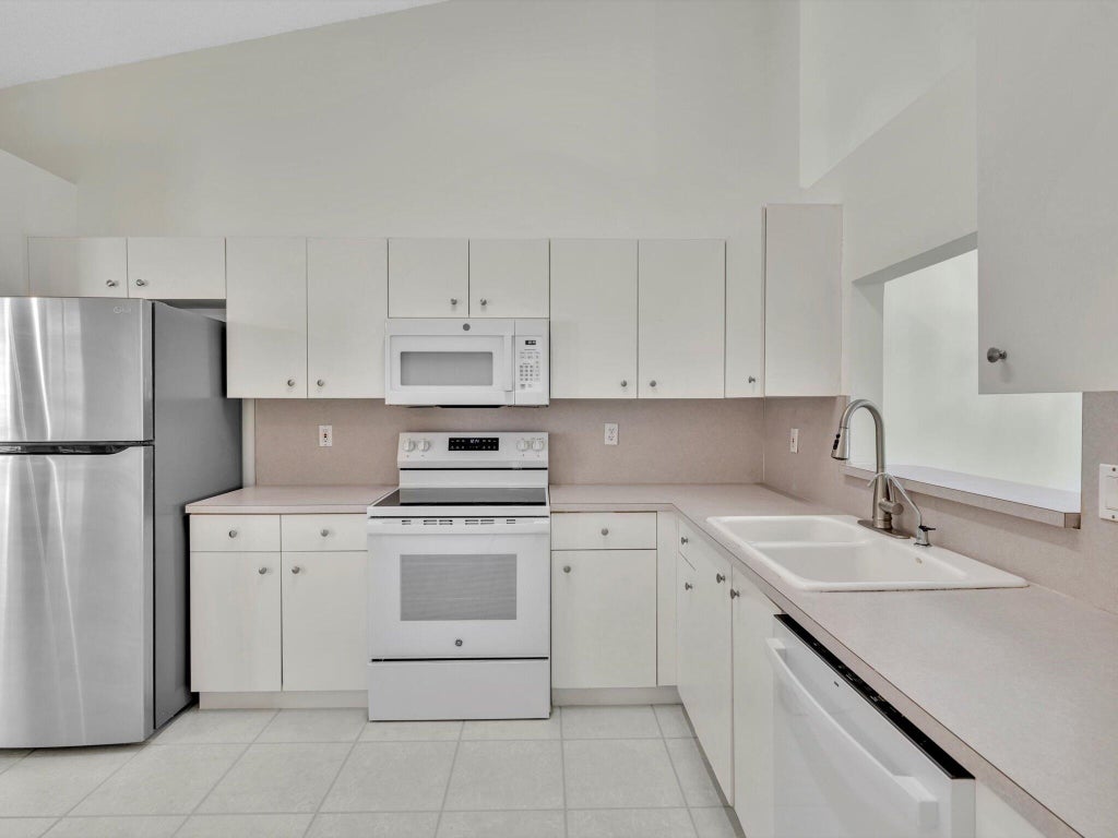 Photo of 6094 Lake Hibiscus Drive, Delray Beach, FL 33484 (MLS # R11149531)