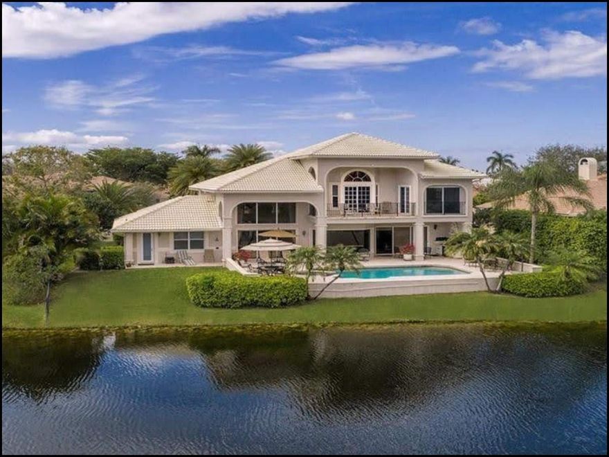 Experience a rare blend of elegance, comfort, and prime location in this one-of-a-kind Coral Springs estate, located in the prestigious guard-gated Eagle Trace community. Set on a quiet cul-de-sac with serene lake and golf course views, this custom two-story residence offers timeless sophistication and functional luxury.Enter through double doors into a grand foyer with soaring ceilings, marble floors, and refined architectural details. The formal living and dining areas feature a striking architectural fireplace, custom millwork, and an abundance of natural light. Full hurricane-impact windows and doors provide security and peace of mind throughout. The chef’s kitchen is designed for both function and entertaining, showcasing granite countertops, custom solid-wood cabinetry with LED lighting, a Sub-Zero refrigerator, a Dacor 6-burner gas range with pot filler, stainless-steel appliances, and a spacious island seamlessly opening to the family room and casual dining area - designed for both everyday living and entertaining.Privately positioned on the upper level, the primary suite offers a true owner’s retreat with a sitting area, a private balcony overlooking the lake and golf course, and a spa-style bathroom featuring a Jacuzzi tub, dual vanities, and a spacious walk-in shower.The backyard is a private oasis featuring a heated pool  (gas-heated), expansive travertine patio, and a fully equipped summer kitchen with built-in grill, dual-burner cooktop, sink, and refrigerator — ideal for entertaining and enjoying Florida’s outdoor lifestyle.Additional features include: a two-car garage with tile flooring and custom built-in cabinetry, an extended driveway, a central vacuum system, and a security camera system.Community amenities include 24-hour guard-gated security with roving patrol, a newly built clubhouse (approximately one year old) with fitness center and social gathering spaces, tennis, pickleball, and basketball courts, playground, common area maintenance, garbage collection, and street lighting. Residents enjoy golf course views, with optional membership or pay-to-play access available separately. Golf access is not included in the HOA. The home is positioned away from active fairways, offering privacy and peace while still enjoying the beauty of the golf community.Home is sold unfurnished. Select furniture, including patio/outdoor items, may be available for purchase separately.