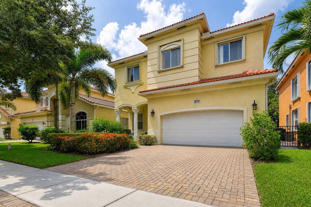 Photo of 241 Gazetta Way, West Palm Beach, FL 33413 (MLS # B26043310)