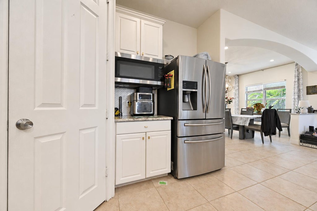Photo of 2449 SW Gay Circle, Port Saint Lucie, FL 34953 (MLS # B26073217)