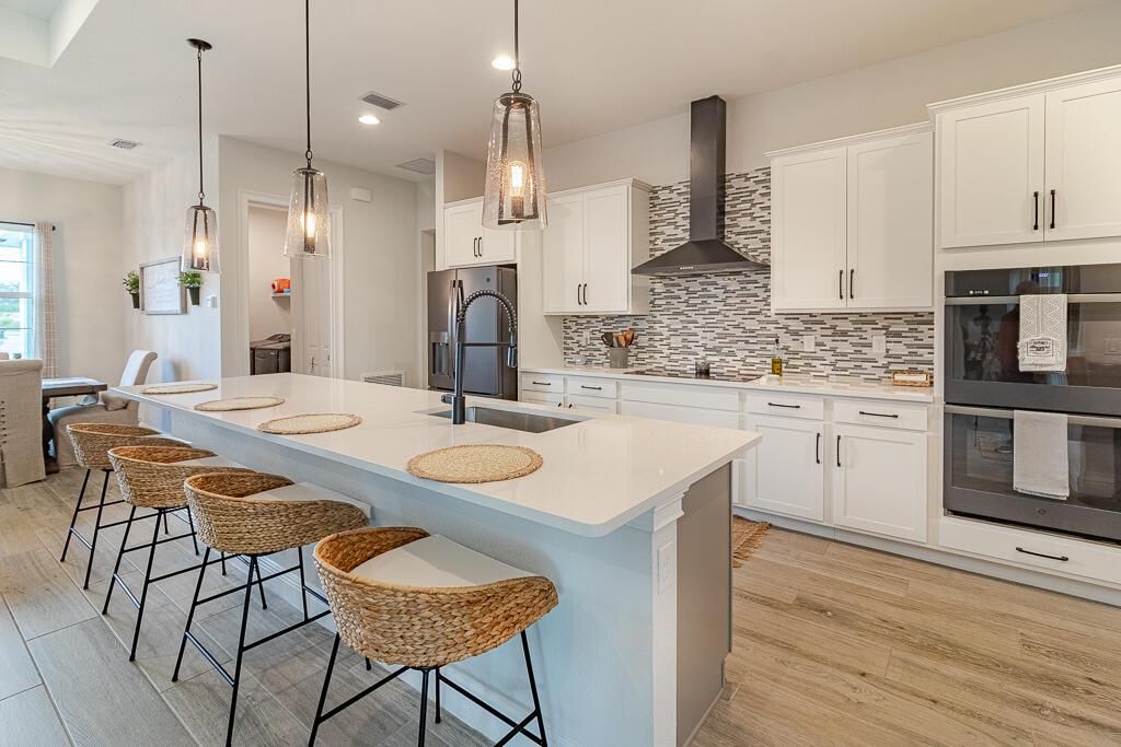 Photo of 5956 NW Hann Drive, Port St Lucie, FL 34986 (MLS # R10906720)