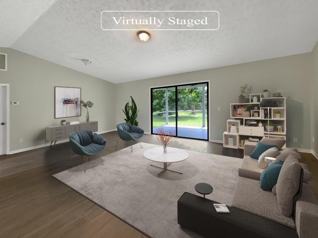 Photo of 310 SE Crosspoint Drive, Port Saint Lucie, FL 34983 (MLS # R11022224)