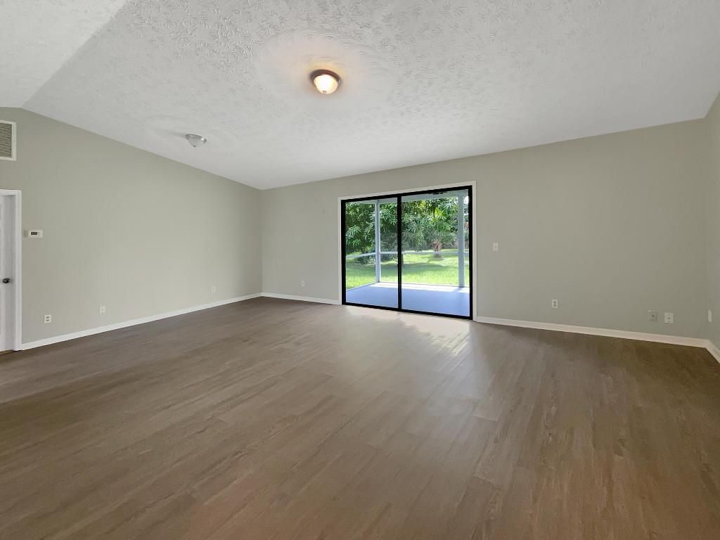 Photo of 310 SE Crosspoint Drive, Port Saint Lucie, FL 34983 (MLS # R11022224)