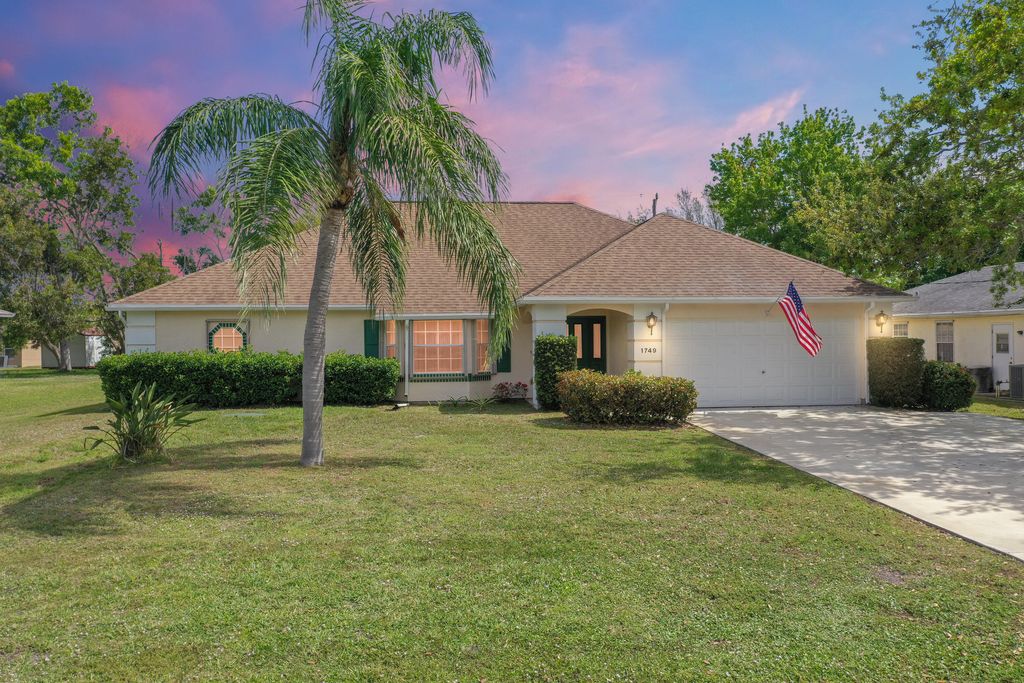 Photo of 1749 SE Berkshire Boulevard, Port Saint Lucie, FL 34952 (MLS # R11066486)