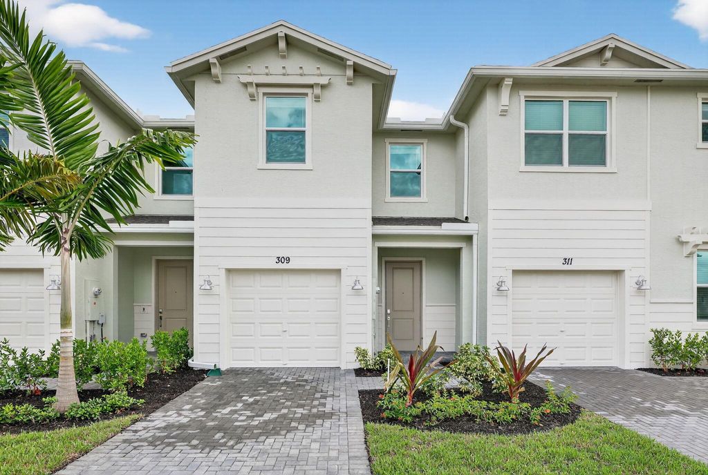 Photo of 309 SE Crossoak Lane, Port Saint Lucie, FL 34984 (MLS # R11123593)