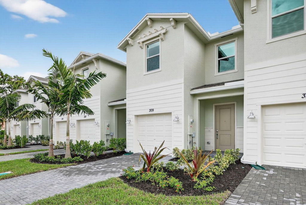 Photo of 309 SE Crossoak Lane, Port Saint Lucie, FL 34984 (MLS # R11123593)